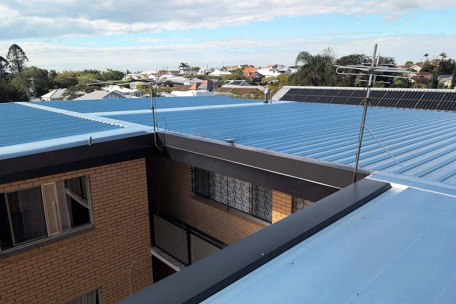 Completed KLIP-LOK metal roof on an Ascot unit block
